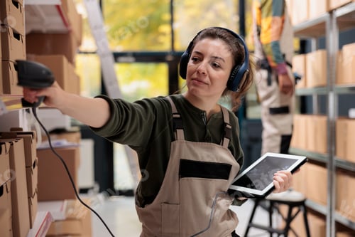 Preview: Supervisor wearing headset listening music during inventory