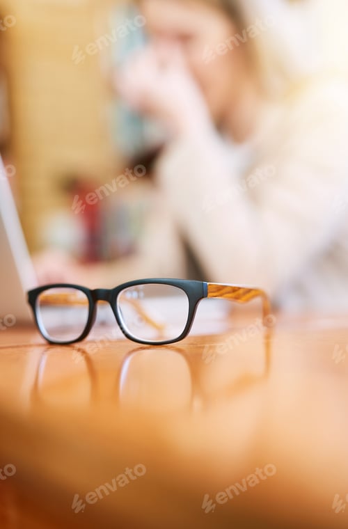 Preview: Your vision should be as clear as your future. Shot of a pair of glasses on a table indoors.