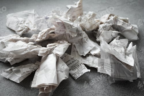 Preview: Many crumpled receipts from stores. The concept of shopping, taxes and budget