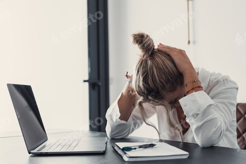 Preview: Stressed tired woman in pain having strong terrible headache attack after computer