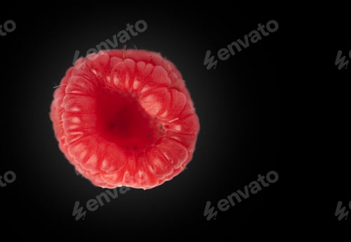Preview: Raspberry. Raspberry isolated. Raspberry on black background on left horizontal