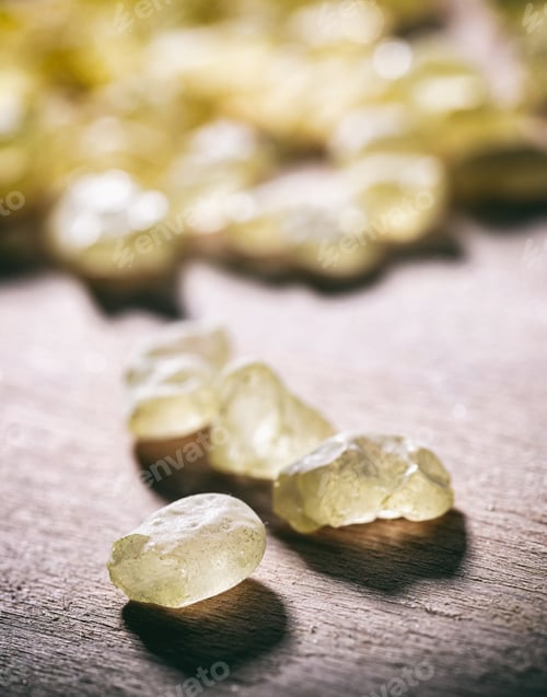 Preview: Chios mastic tears on wooden background, closeup view