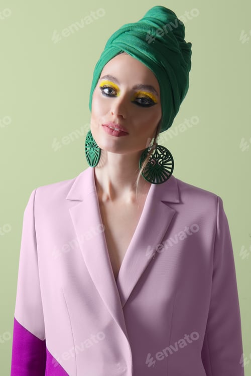 Preview: Pretty fashion model in bi color jacket and turban on head