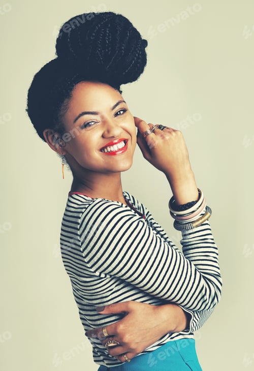 Preview: Smiles are always in fashion. Shot of a fashionable young woman posing in the studio.