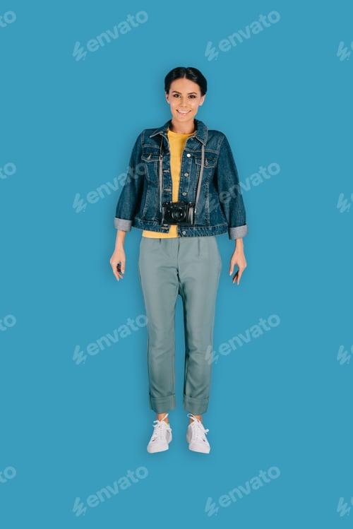 Preview: top view of stylish female photographer with camera isolated on blue background