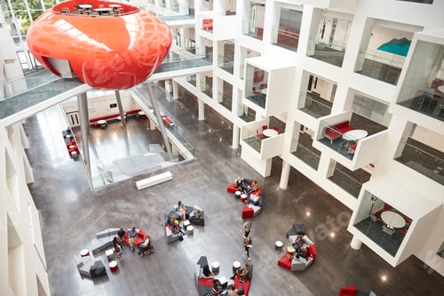 Preview: Modernist interior of a university atrium, elevated view