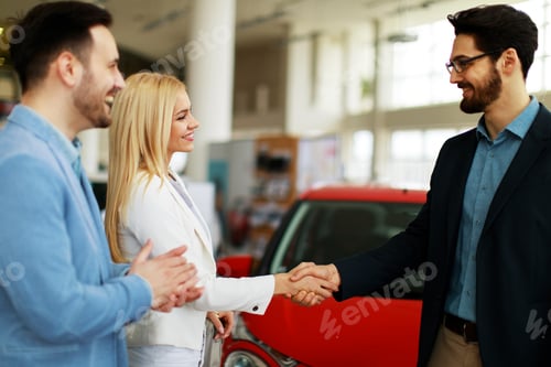 Preview: Happy Man and Woman Conclude Car Dealership Purchase