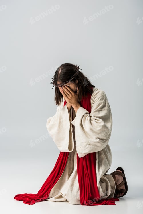 Preview: jesus in wreath covering face while praying on knees on grey