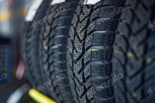 Preview: Selective focus shot of car wheels at the auto repair shop