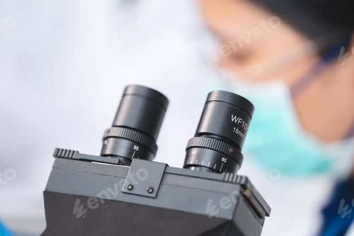 Preview: researcher working in laboratory for medicals science research using scientific equipment technology