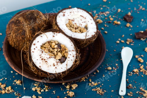 Preview: Healthy breakfast in coconut bowl.