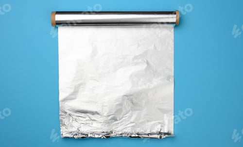 Preview: Shiny Aluminum Foil Sheet and Roll on Blue