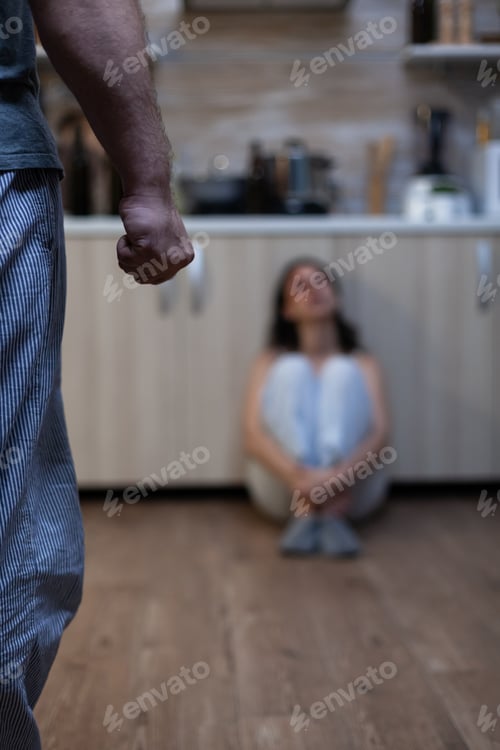 Preview: Close up of clenched fist of aggressive man after abusing woman