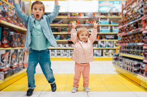 Preview: Boy and girl raised their hands up in kids store