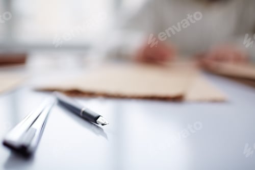 Preview: Pen on table