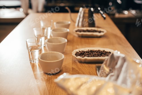 Preview: close up view of arranged bowls with coffee beans and grind coffee for food function on wooden