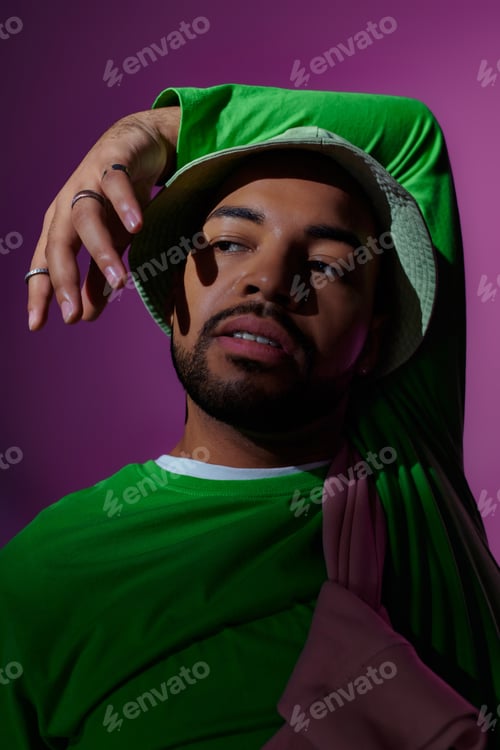 Preview: portrait of handsome man in casual attire with mouth slightly open looking away, fashion concept