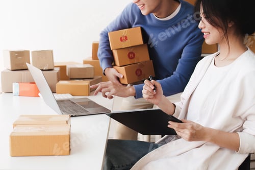 Preview: Small business owners couple entrepreneurs working with parcel, e-business, marketing, online shop