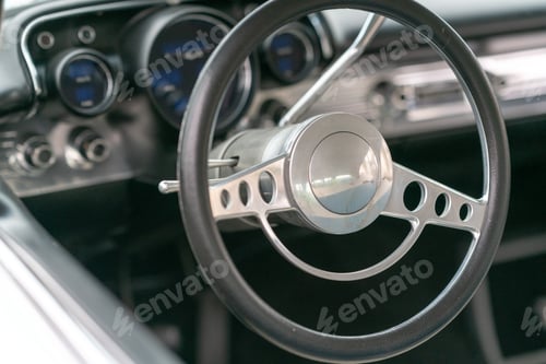 Preview: Close up of driver's wheel of vintage car