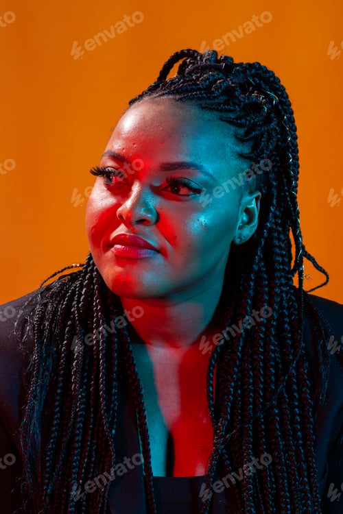 Preview: Beauty portrait of attractive african american woman with big afro and glamour makeup