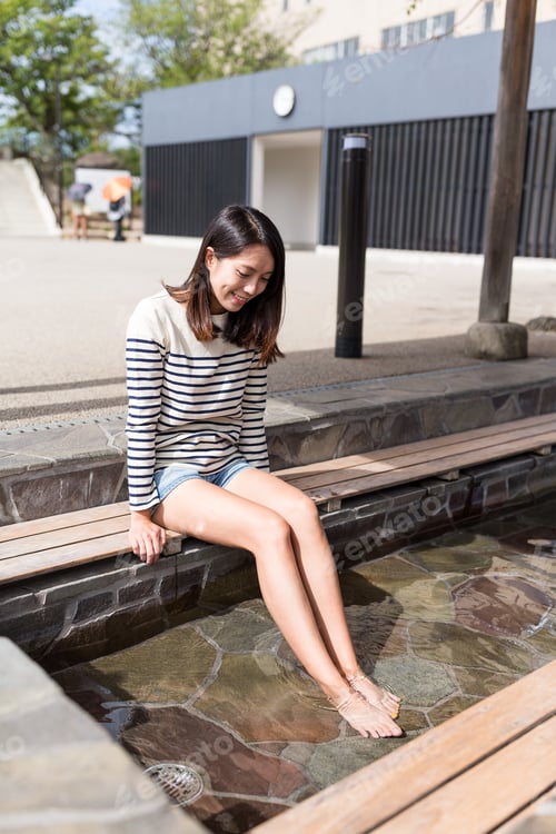 Preview: Woman enjoy foot onsen