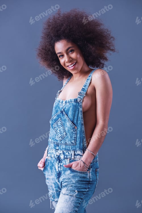 Preview: Beautiful woman in jean overalls