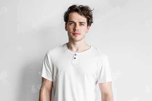 Young Man Posing in a White T-Shirt