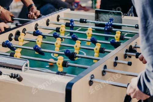 Preview: Friends play table football game, spend free time in entertainment center