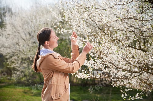 Preview: Woman allergic suffering from seasonal allergy at spring.