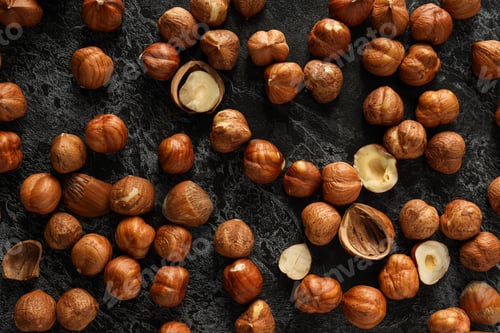 Preview: Healthy food and healthy nutrition concept, nuts - hazelnut