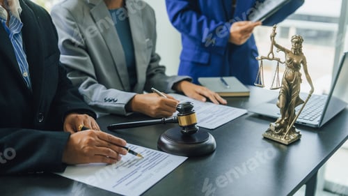 Preview: Business lawyer team working with law firms contracts in working room.