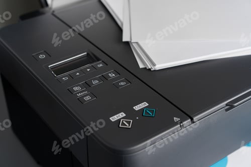 Preview: Close up of modern printer in the office