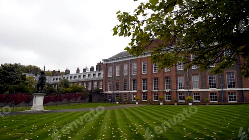 Preview: Clean yard with green lawn of old estate. Action. Old manor house with outside courtyard and perfect