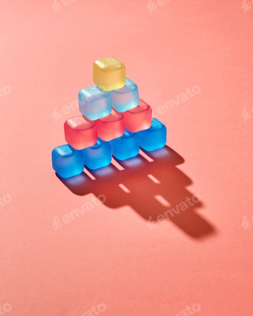 Preview: Creative pyramid from colored plastic cubes with liquid, shadows on a background in a color of the
