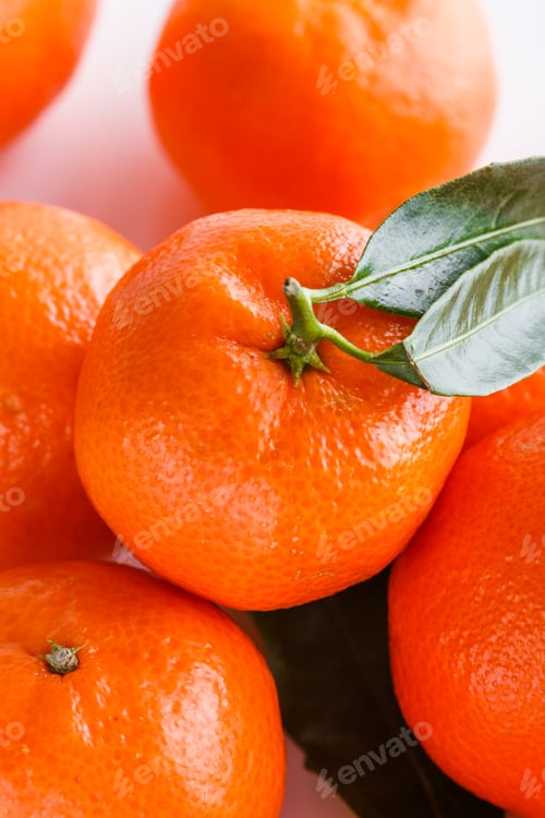 Preview: juicy mandarin on a white acrylic background