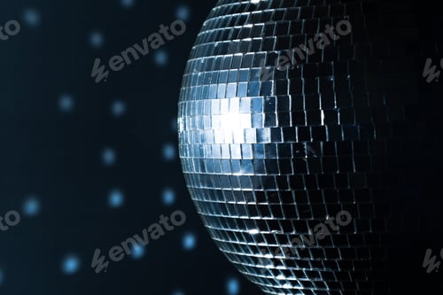 Preview: Shimmering disco ball reflecting colorful lights in a dark setting at a lively dance party