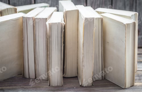 Preview: book on wooden background with space for text, concept of knowledge