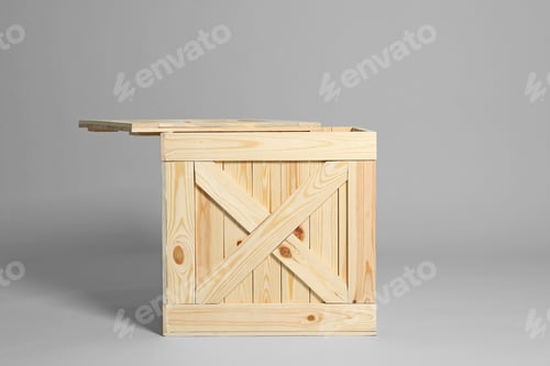 Preview: One open wooden crate on grey background