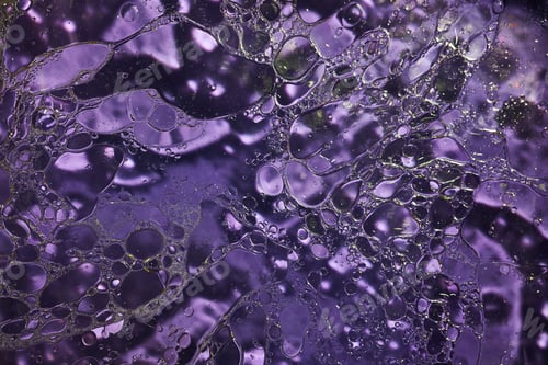 Preview: Closeup shot of a purple water surface with bubbles