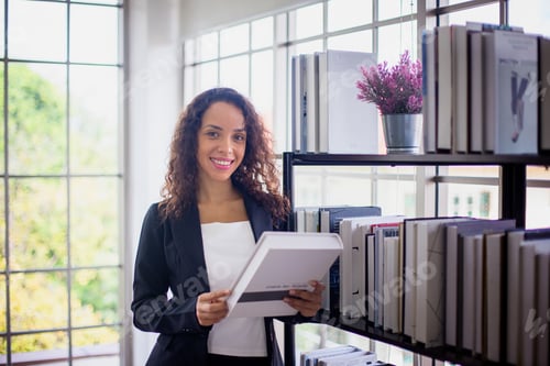 Preview: business woman in office.