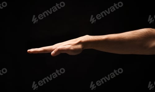 Preview: Strong male hand on black isolated background