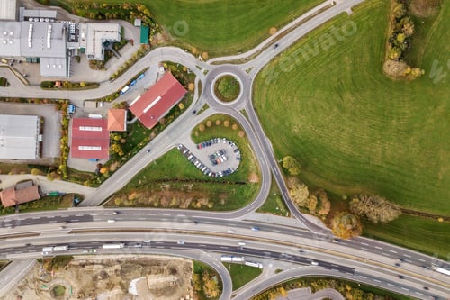 Preview: Top down aerial view of freeway interstate road with moving traffic cars in rural area