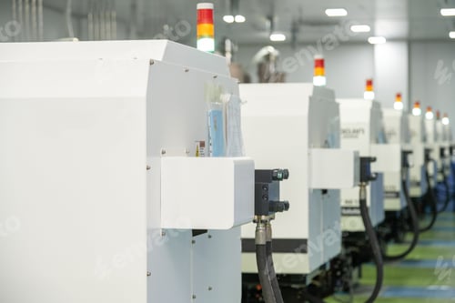 Preview: Selective focus of a molding machine in a factory for the production of medical supplies