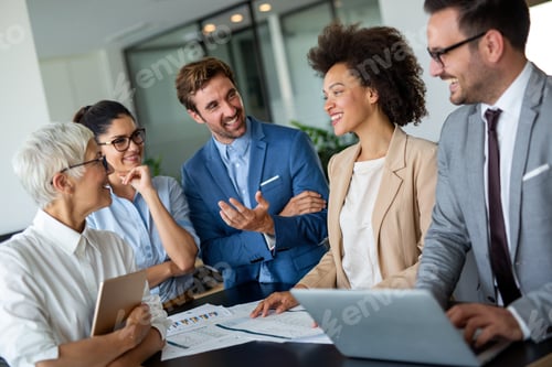 Preview: Happy group of business team celebrating a good job in the office. Business and finance concept.