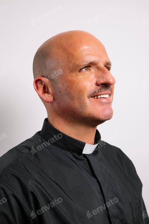 Preview: Portrait of a priest in a black shirt.