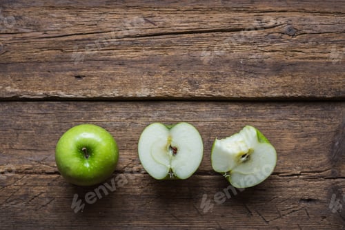 Preview: Ripe green apples on wooden background