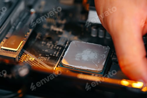 Preview: Male hands repairing computer hardware close up