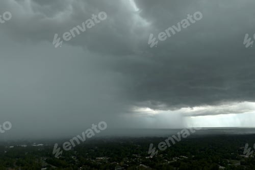 Preview: Rainstorm shower over Florida rural town in humid summer season.