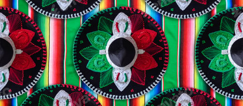 Preview: Mariachi hats with colors of the Mexican flag on serape. Colorful banner.