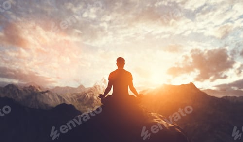 Preview: Man in yoga pose, zen meditation at sunset.